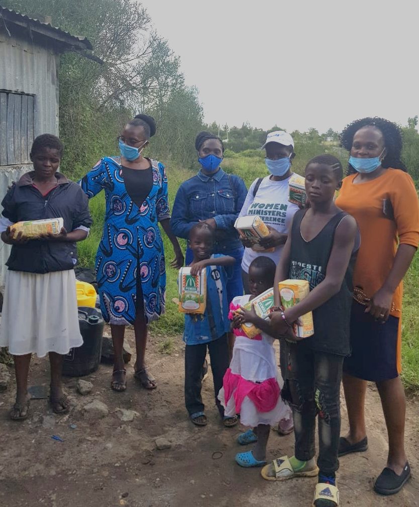 Dignity and Hope Initiative - schoolgirl receiving sanitary kits